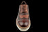 Zapatillas de vestir Oxford de cuero de plena flor en color marrón y con punta de ala para hombre